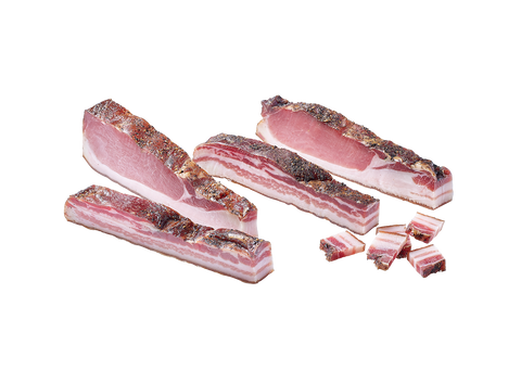 Mehrere Riegel streifiger Brettlspeck mit rosa-weißer Maserung und gewürfelten Stücken